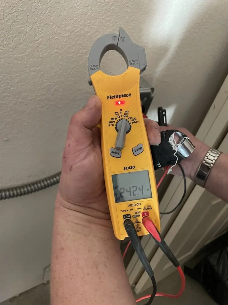 Voltage testing with clamp meter during Electrical Installation Services in Battle Ground